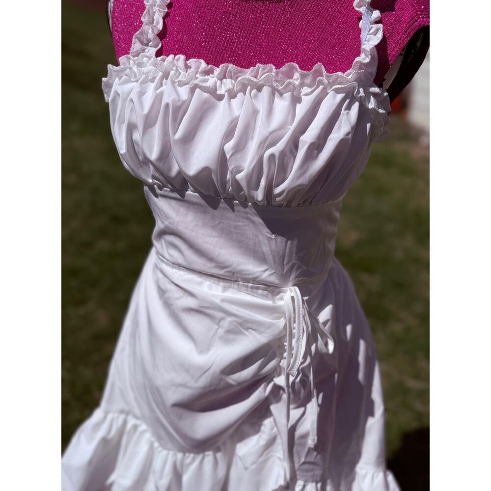 White ruffled dress with multi sleeve options, bustled top Wedding dress